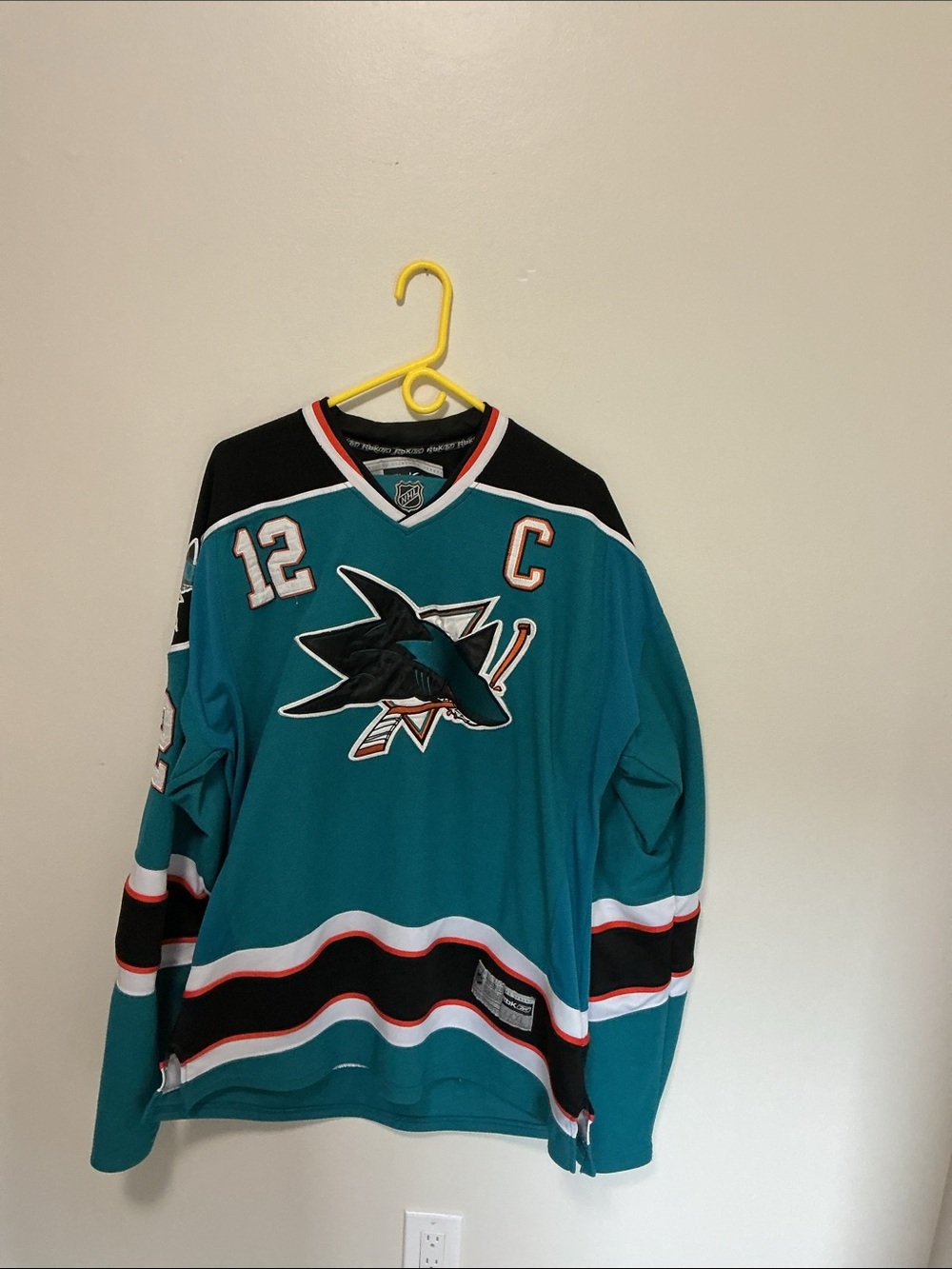 Teal Sharks Marleau jersey and cap